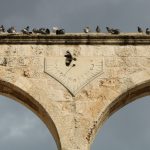 low angle photography of concrete arch