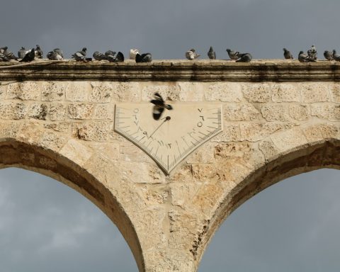 low angle photography of concrete arch