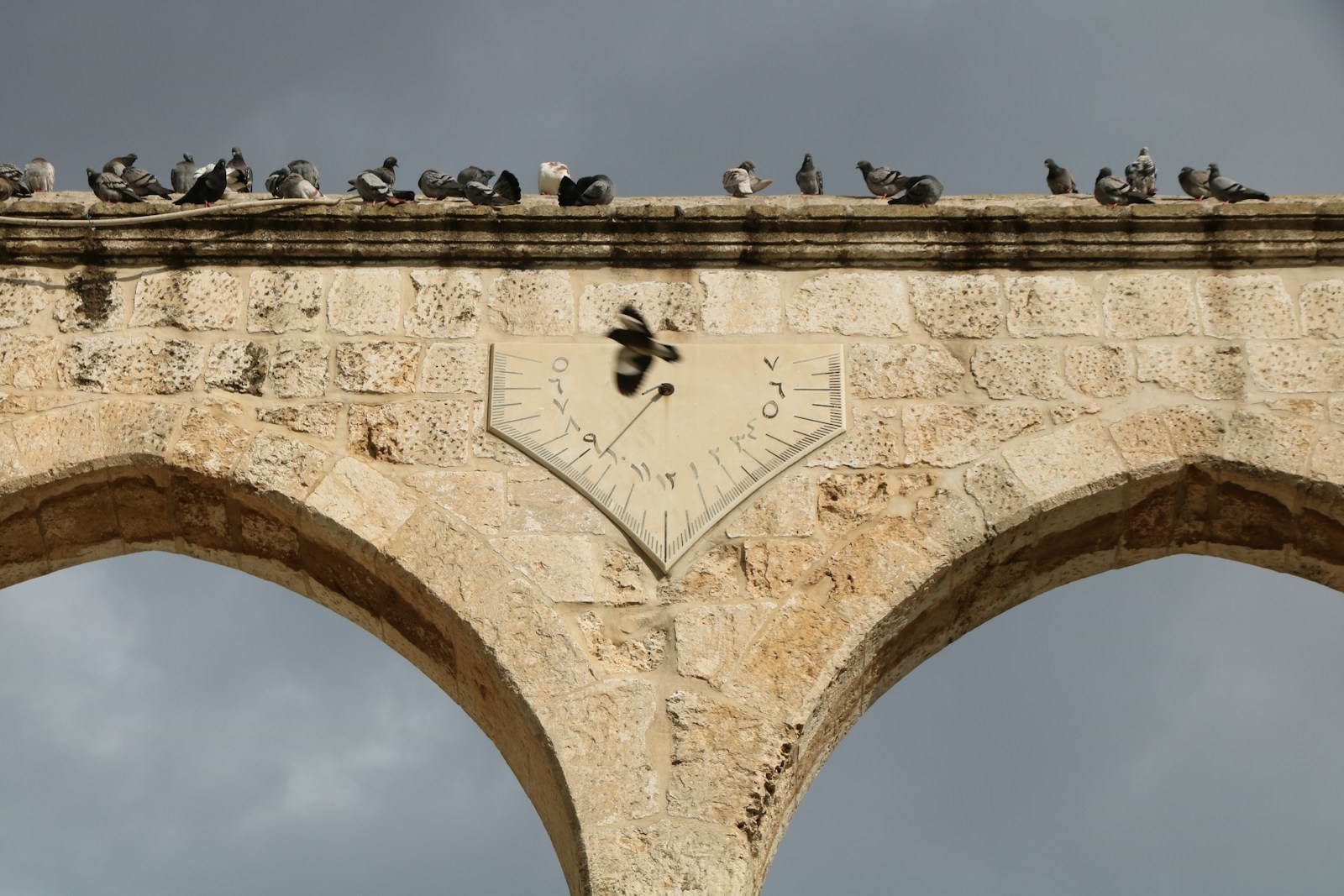 low angle photography of concrete arch