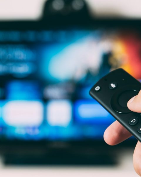 turned-on flat screen television